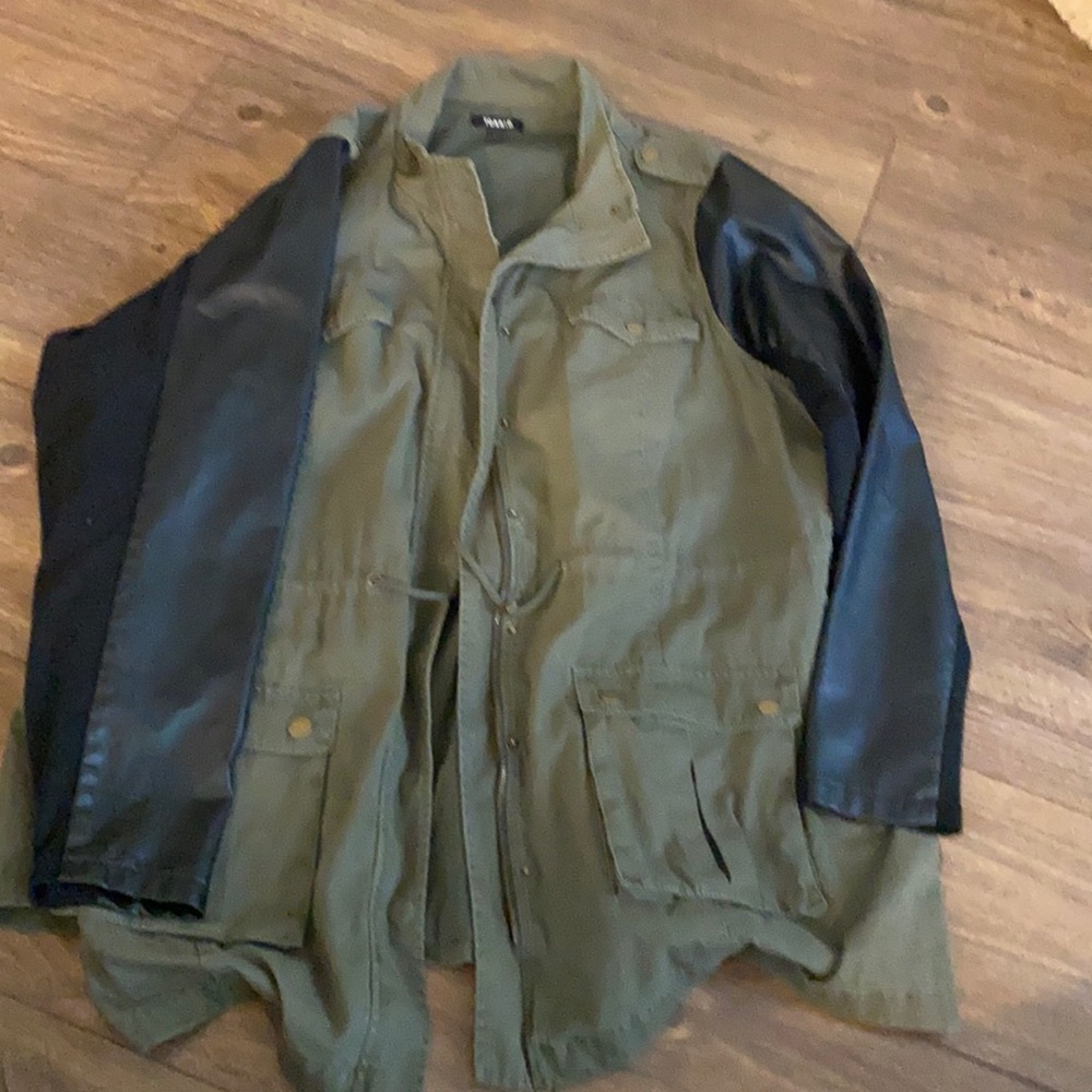 Utility jacket with faux leather sleeve